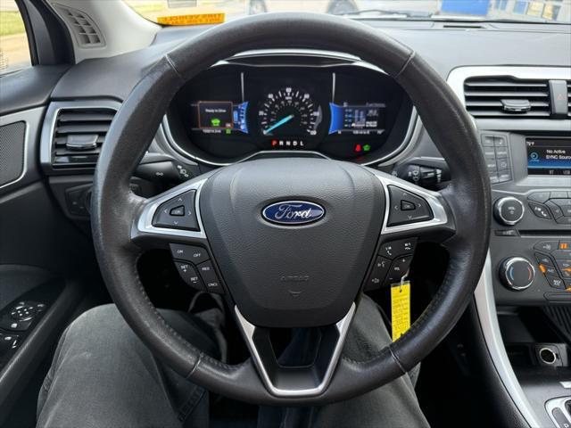 used 2016 Ford Fusion Hybrid car, priced at $10,000