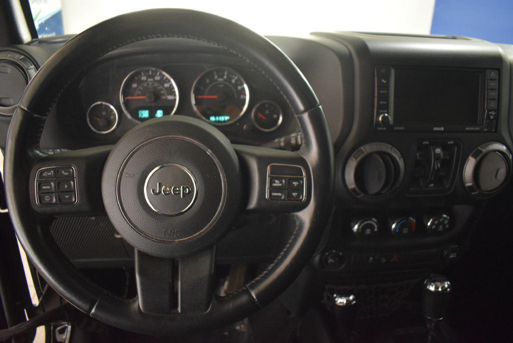 used 2016 Jeep Wrangler Unlimited car, priced at $13,972