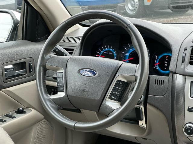 used 2012 Ford Fusion car, priced at $6,000