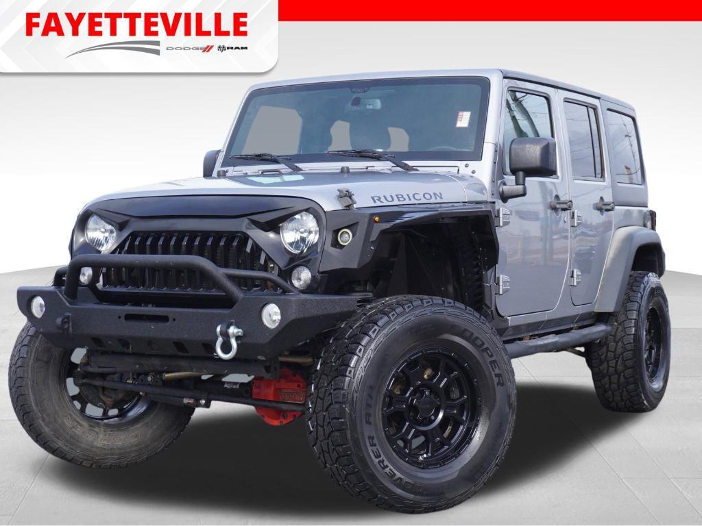 used 2015 Jeep Wrangler Unlimited car, priced at $18,996