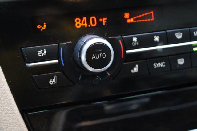 used 2015 BMW 750 car, priced at $15,812