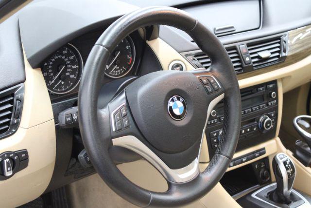 used 2014 BMW X1 car, priced at $9,890