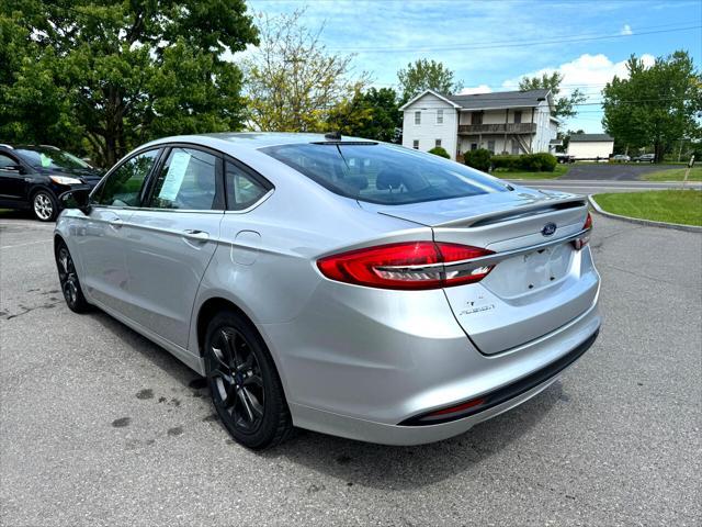 used 2018 Ford Fusion car, priced at $13,995
