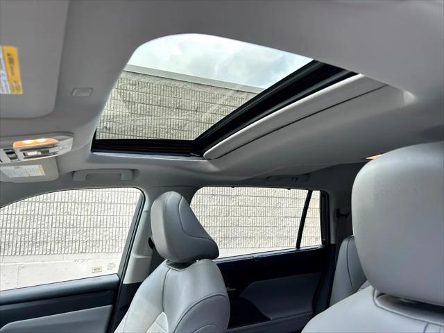 used 2020 Toyota Highlander Hybrid car, priced at $34,995