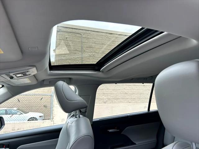 used 2021 Toyota Highlander Hybrid car, priced at $32,950