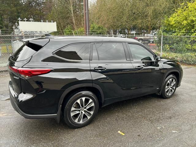 used 2021 Toyota Highlander Hybrid car, priced at $36,995