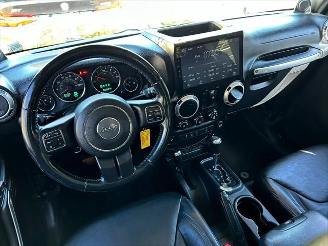 used 2014 Jeep Wrangler Unlimited car, priced at $20,995