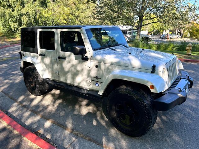 used 2013 Jeep Wrangler Unlimited car, priced at $17,995