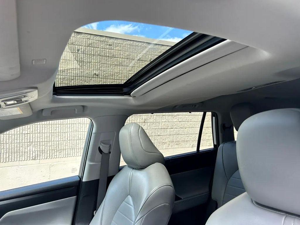 used 2021 Toyota Highlander Hybrid car, priced at $36,995