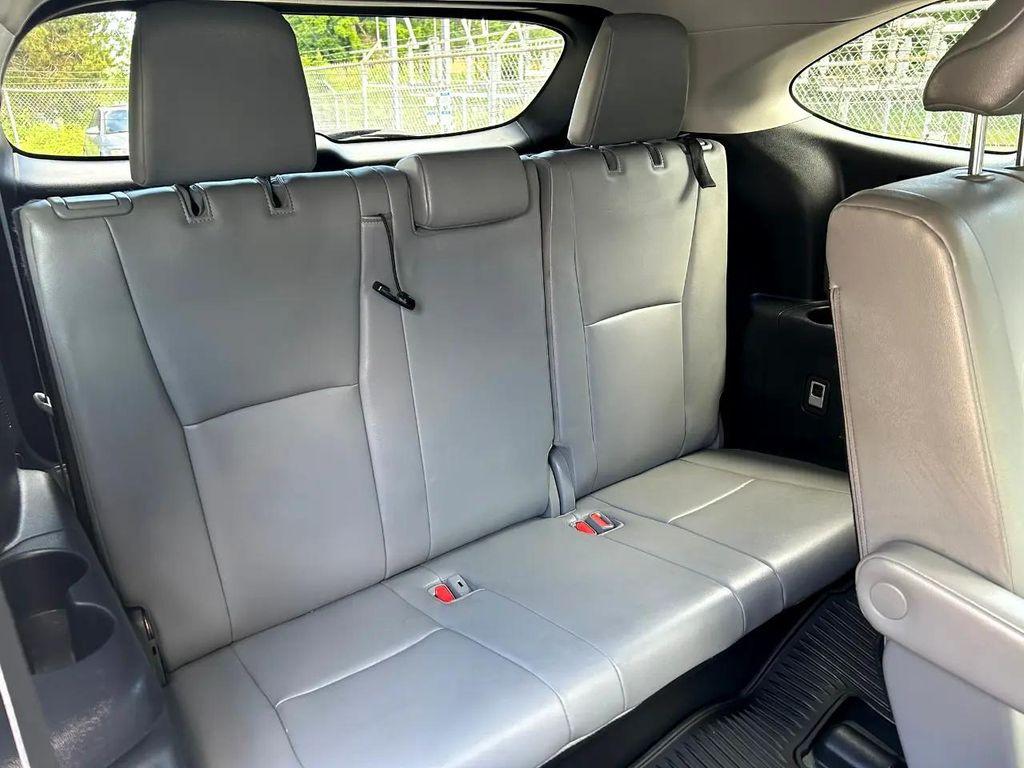 used 2021 Toyota Highlander Hybrid car, priced at $36,995