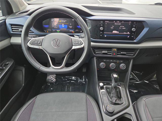 used 2023 Volkswagen Taos car, priced at $21,977