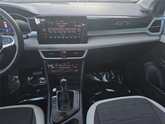 used 2025 Volkswagen Taos car, priced at $25,998