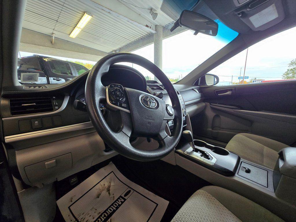 used 2014 Toyota Camry car, priced at $12,000