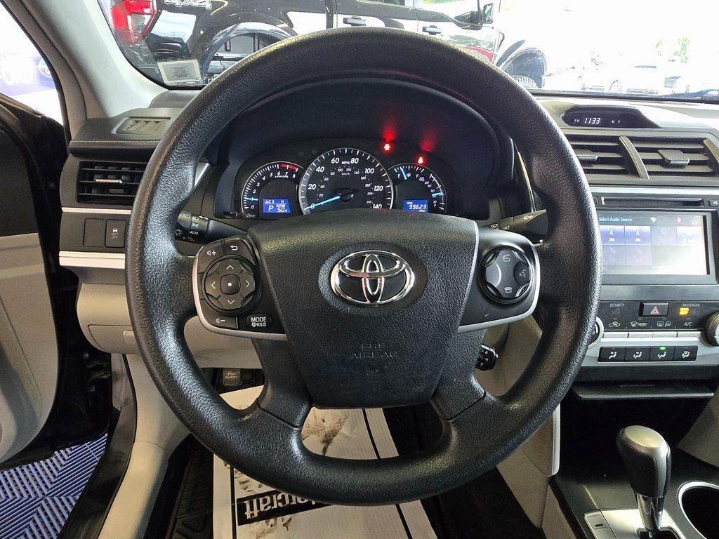 used 2014 Toyota Camry car, priced at $12,000