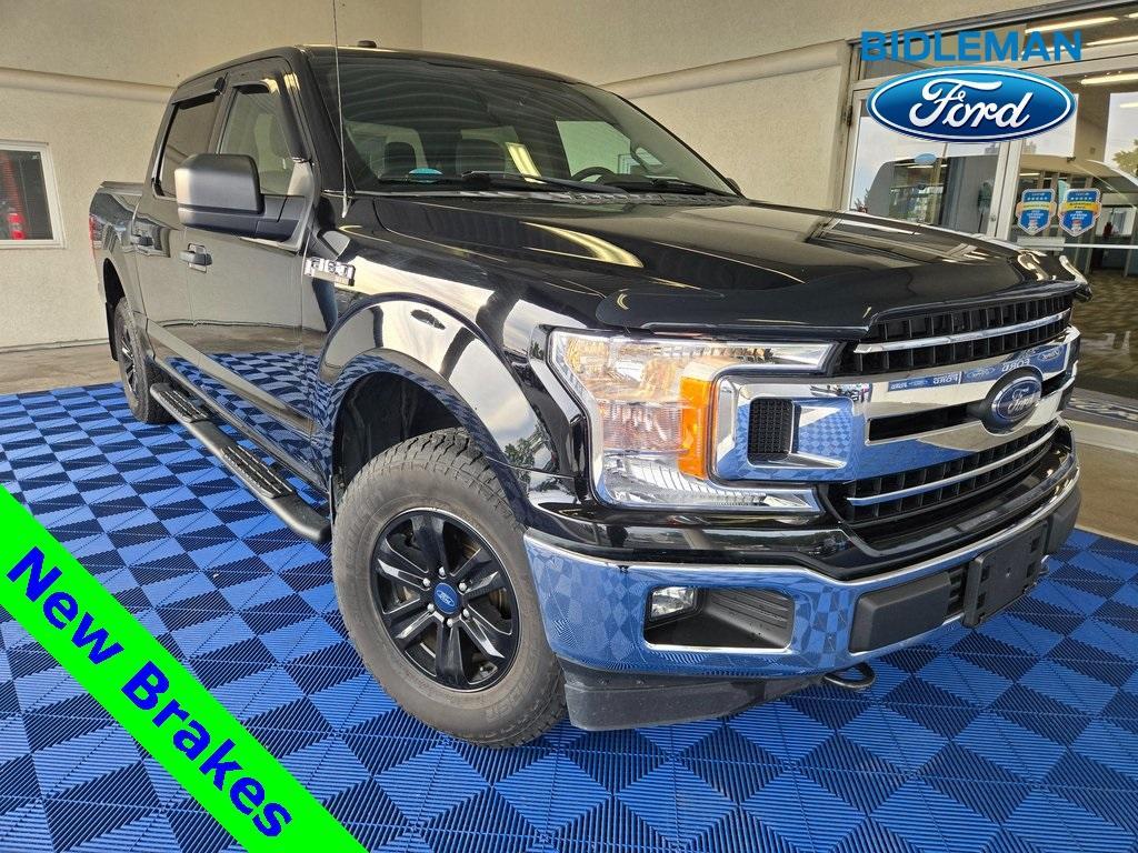 used 2018 Ford F-150 car, priced at $25,323