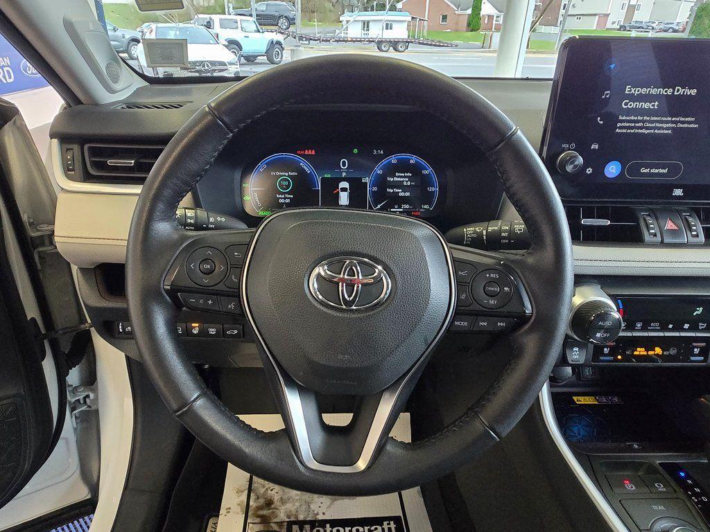 used 2023 Toyota RAV4 Hybrid car, priced at $30,000