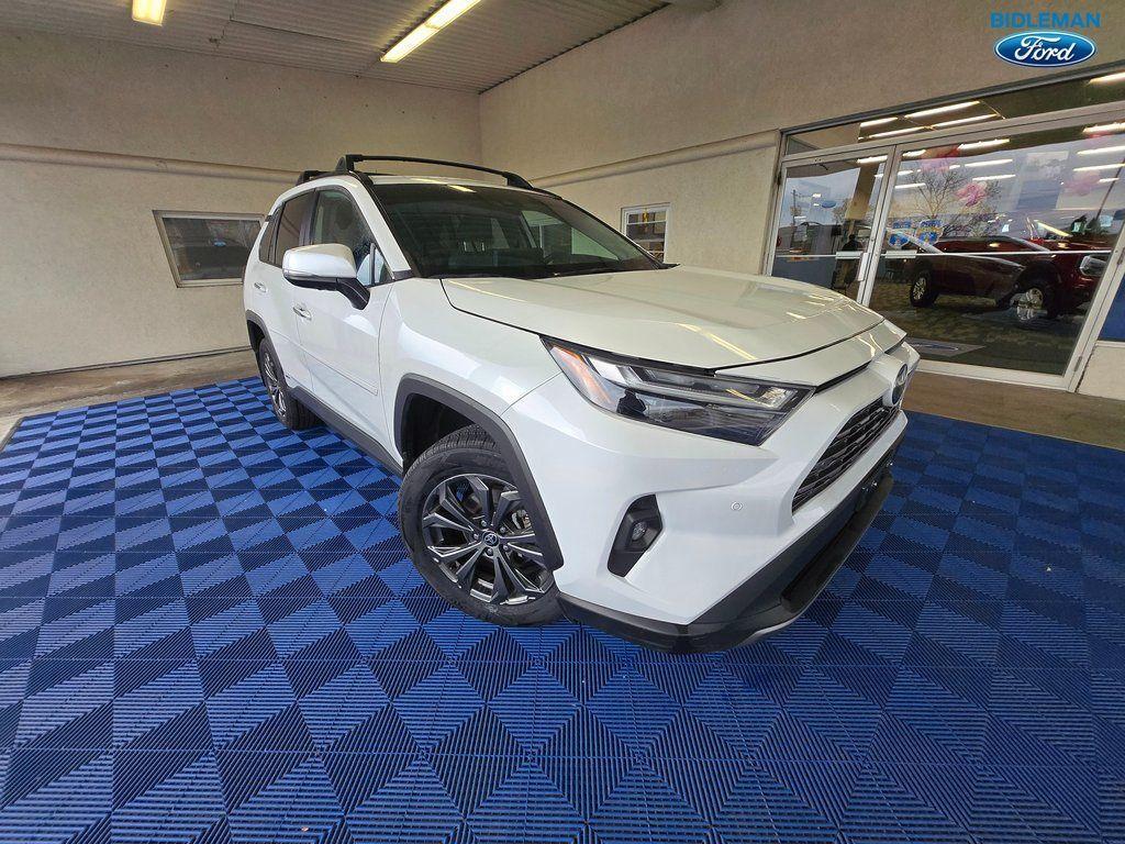 used 2023 Toyota RAV4 Hybrid car, priced at $30,000