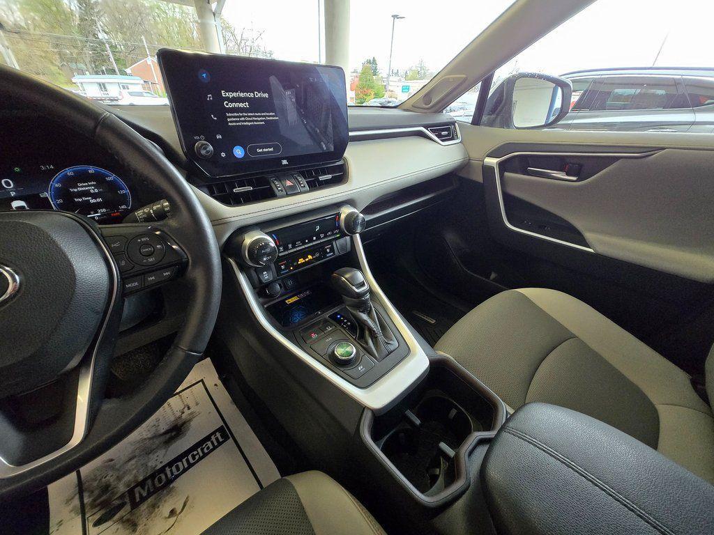 used 2023 Toyota RAV4 Hybrid car, priced at $30,000
