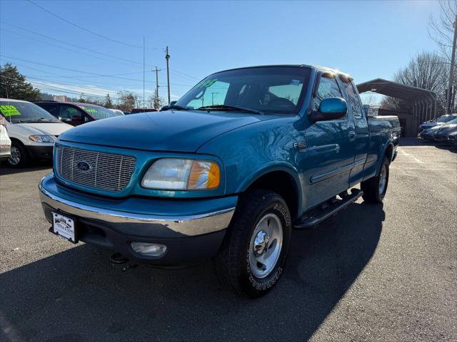 used 1999 Ford F-150 car, priced at $6,995