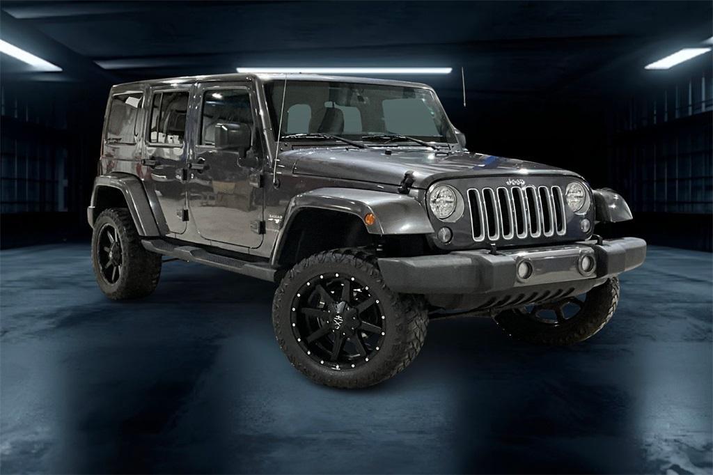used 2016 Jeep Wrangler Unlimited car, priced at $21,211