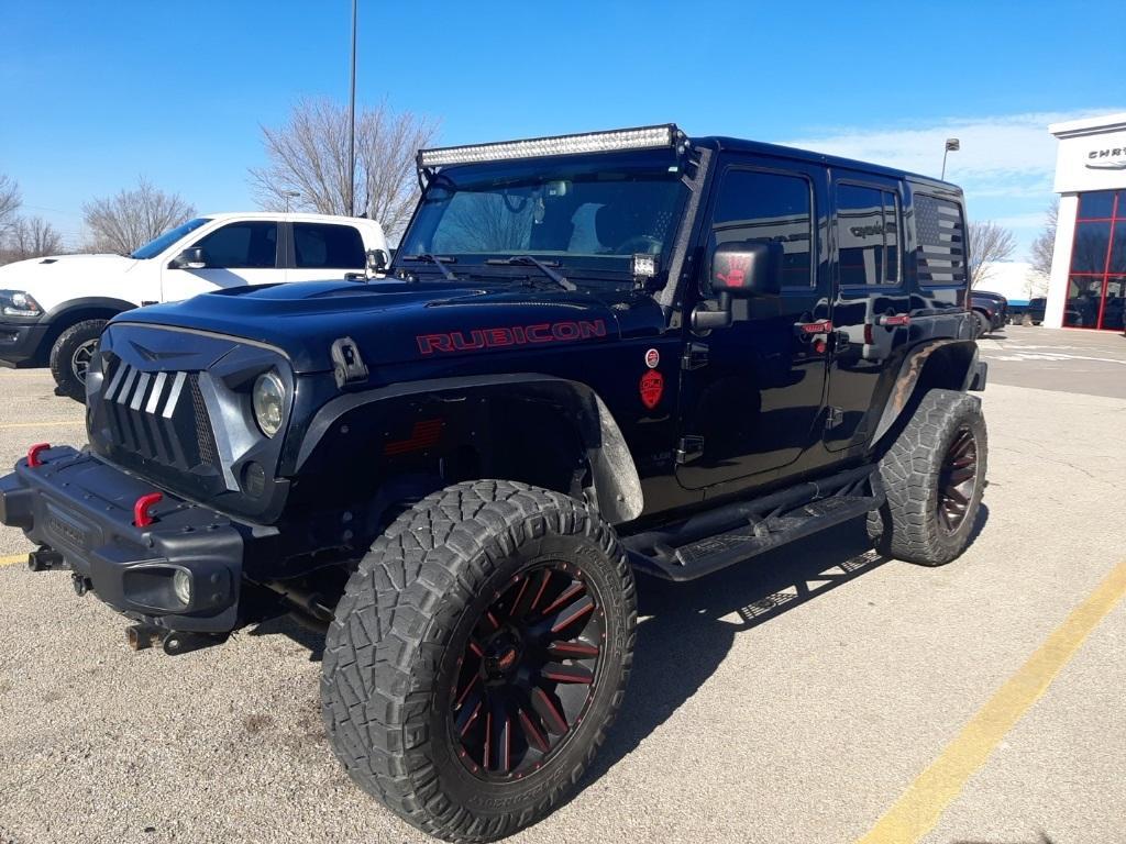 used 2014 Jeep Wrangler Unlimited car, priced at $20,411