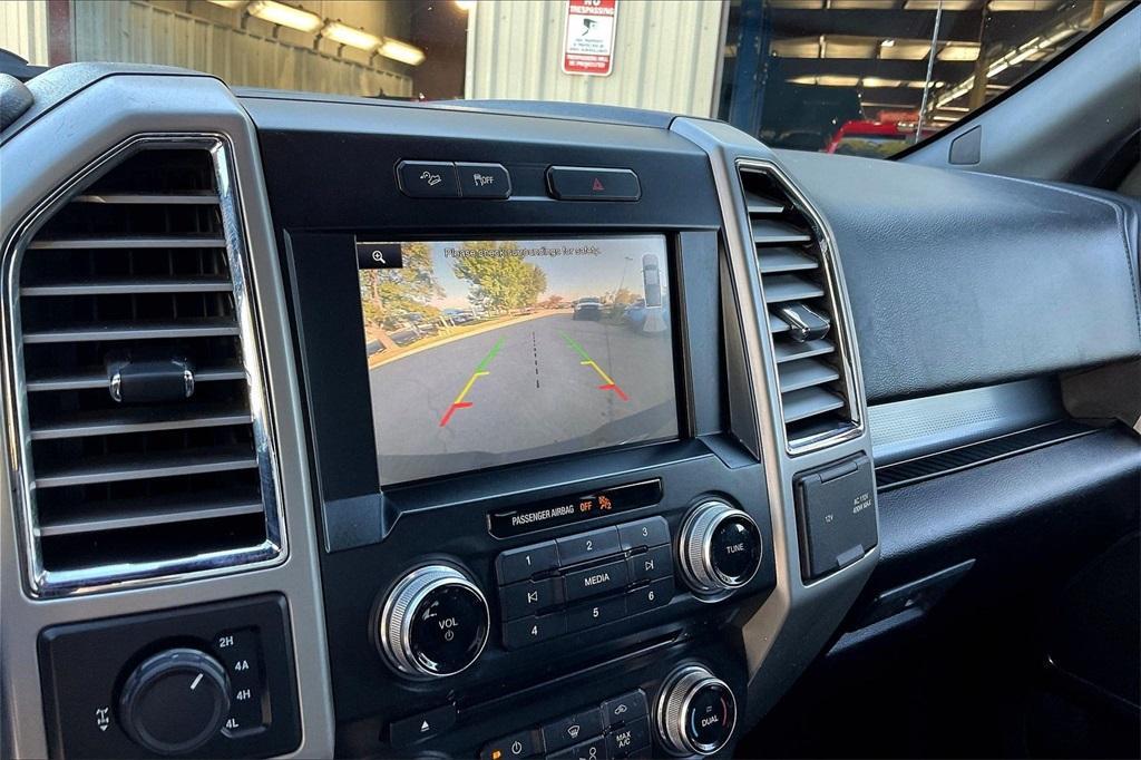 used 2015 Ford F-150 car, priced at $23,811