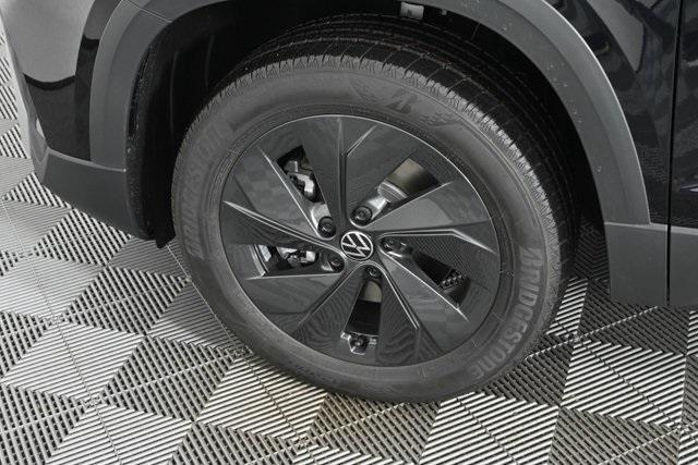 new 2025 Volkswagen Taos car, priced at $27,011