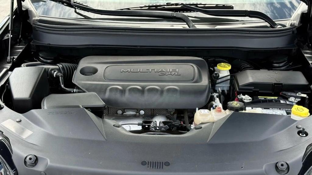 used 2021 Jeep Cherokee car, priced at $16,880
