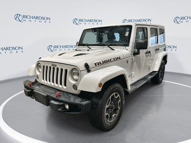 used 2016 Jeep Wrangler Unlimited car, priced at $19,135