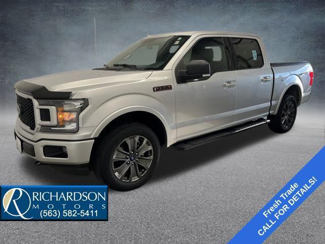used 2018 Ford F-150 car, priced at $12,580