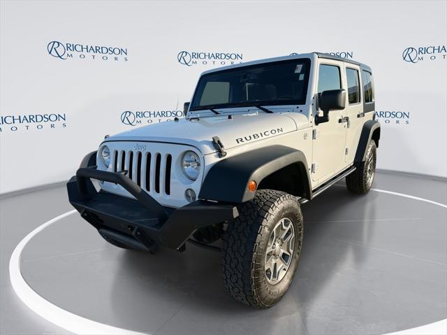 used 2014 Jeep Wrangler Unlimited car, priced at $22,945