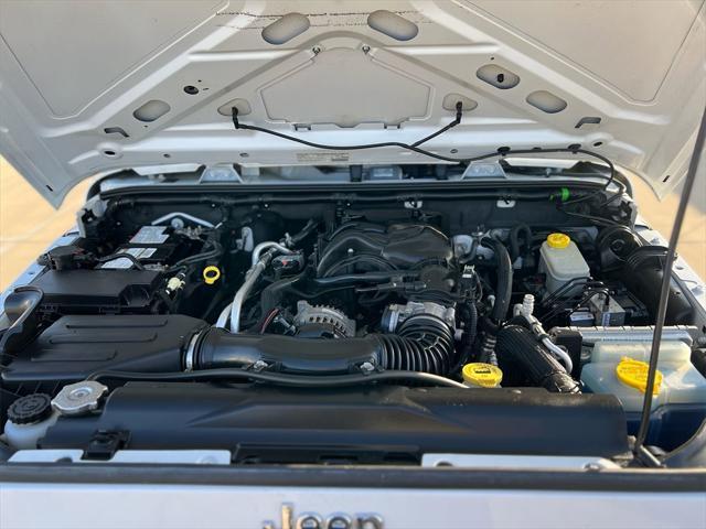 used 2014 Jeep Wrangler Unlimited car, priced at $22,945