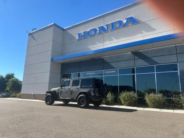 used 2018 Jeep Wrangler JK Unlimited car, priced at $19,621