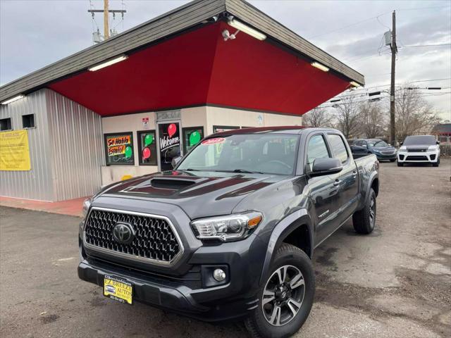 used 2018 Toyota Tacoma car, priced at $27,999