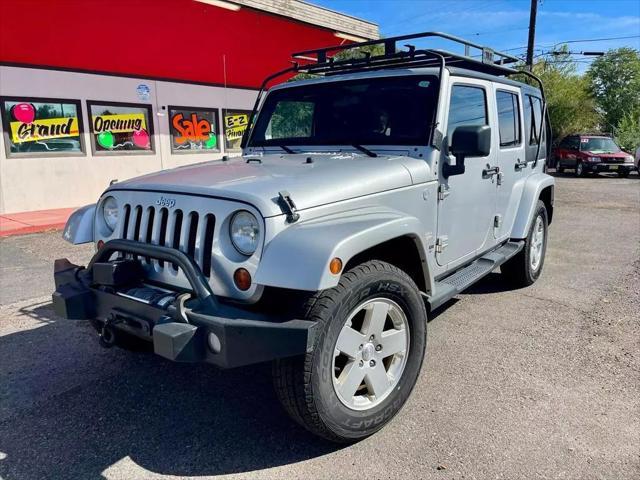 used 2011 Jeep Wrangler Unlimited car, priced at $13,499