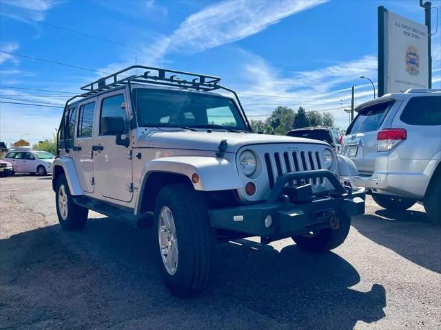 used 2011 Jeep Wrangler Unlimited car, priced at $13,499