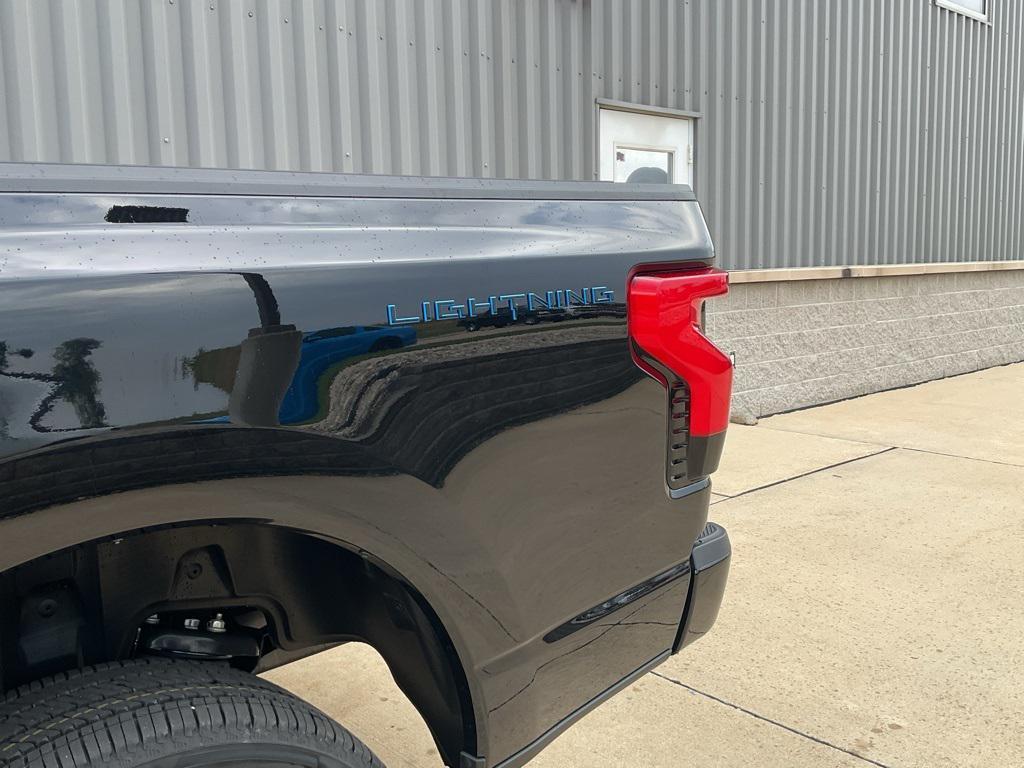 new 2025 Ford F-150 Lightning car, priced at $77,866