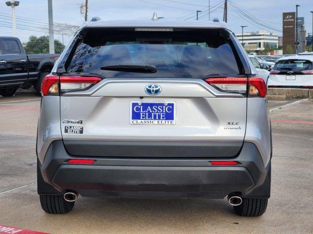 used 2024 Toyota RAV4 Hybrid car, priced at $31,297