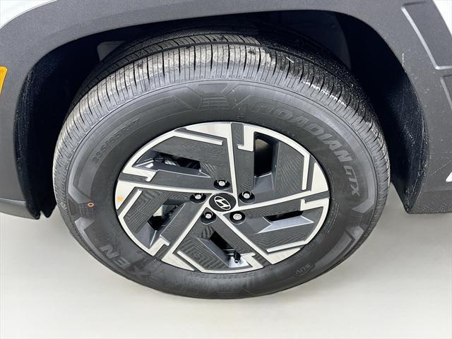 new 2025 Hyundai TUCSON Hybrid car, priced at $33,874