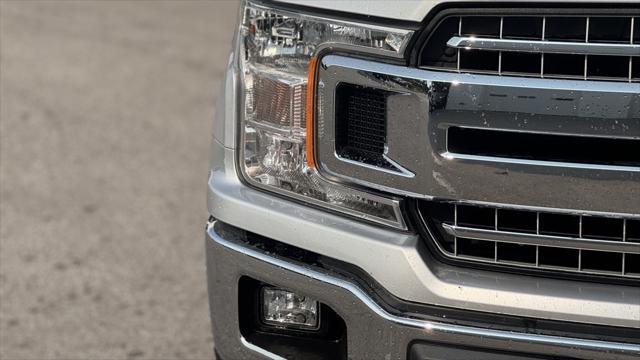 used 2018 Ford F-150 car, priced at $23,900