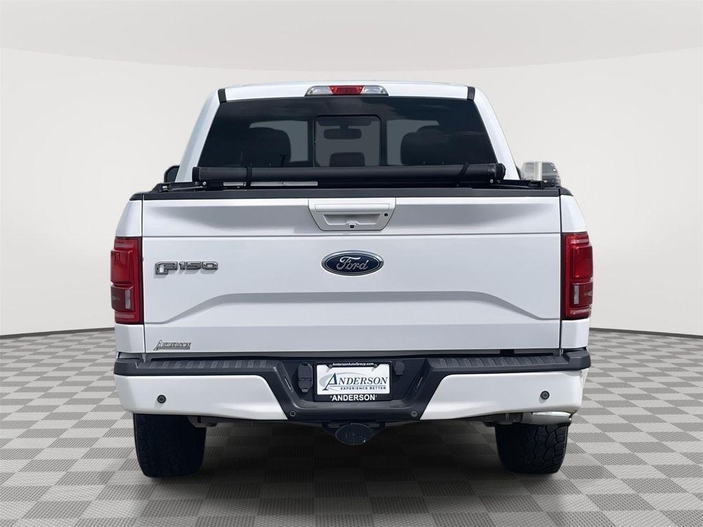 used 2015 Ford F-150 car, priced at $10,000