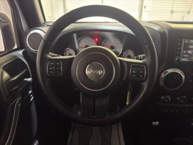 used 2015 Jeep Wrangler Unlimited car, priced at $18,990