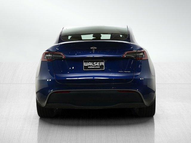 used 2024 Tesla Model Y car, priced at $34,998