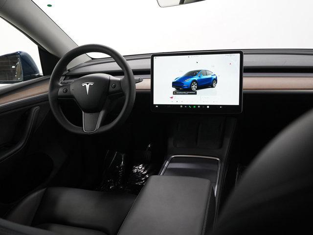 used 2024 Tesla Model Y car, priced at $34,998