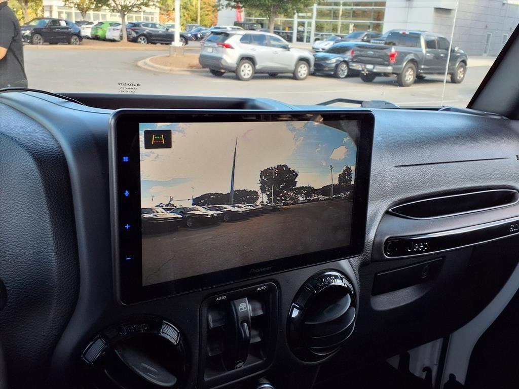 used 2015 Jeep Wrangler Unlimited car, priced at $19,999