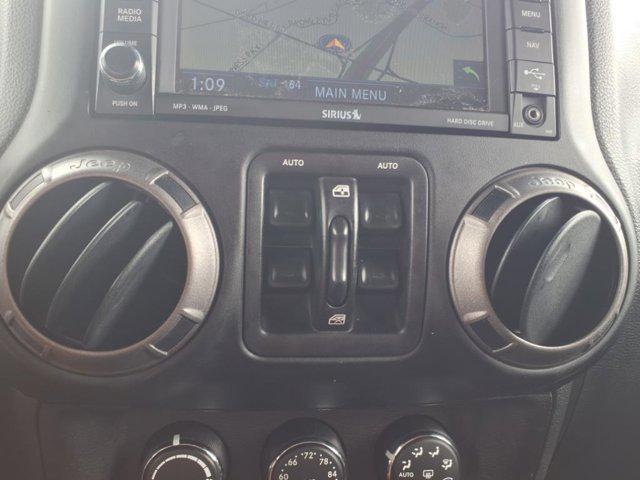 used 2015 Jeep Wrangler Unlimited car, priced at $21,181