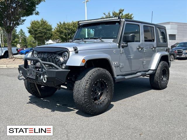 used 2018 Jeep Wrangler JK Unlimited car, priced at $25,500