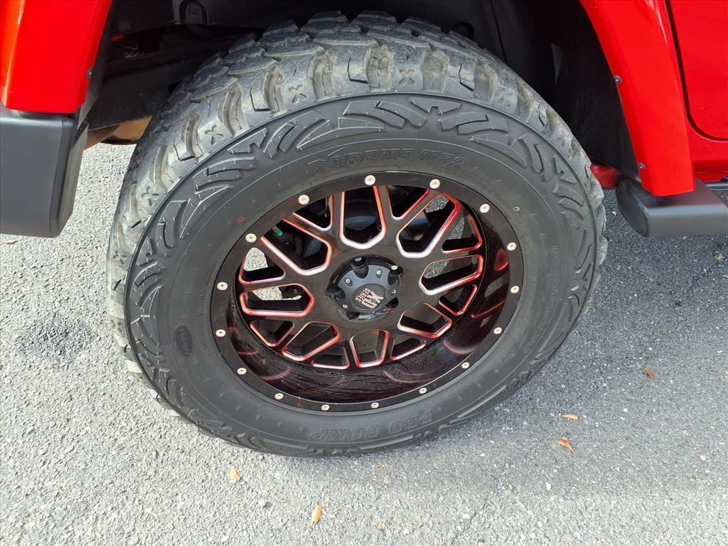 used 2015 Jeep Wrangler Unlimited car, priced at $19,558