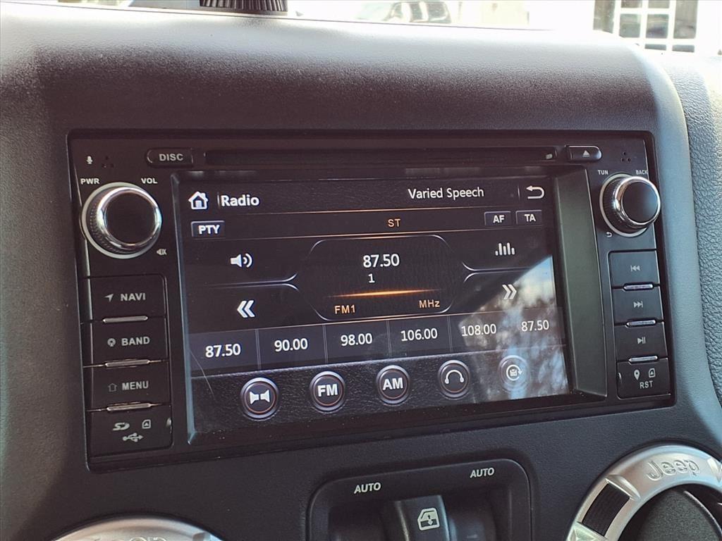 used 2015 Jeep Wrangler Unlimited car, priced at $19,558