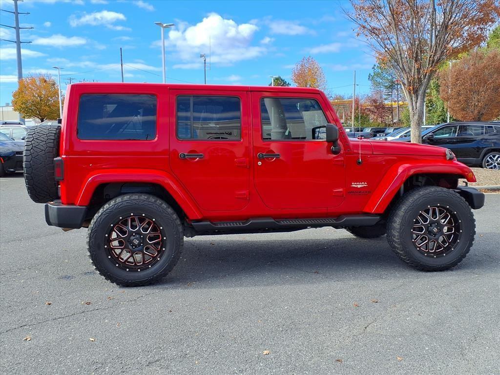 used 2015 Jeep Wrangler Unlimited car, priced at $19,558